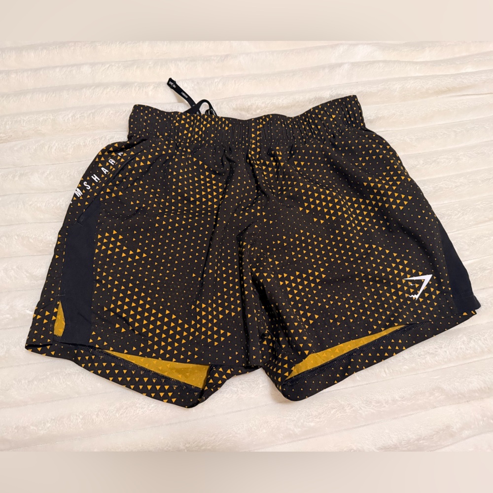 Gymshark Black Shorts with Gold Triangle Print